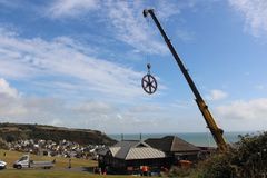 Winding wheel being removed for repair